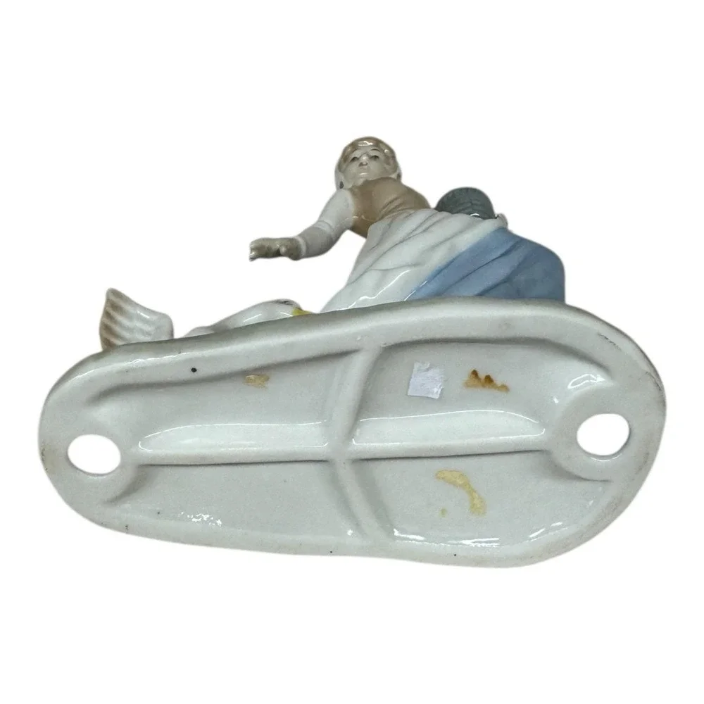 1980 Enesco Fine Porcelain Lady Carrying Eggs with Goose Tugging at Dress‎